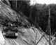Vietnam: US Army road construction team carving a new military road into a hillside in the Central Highlands, c. 1966